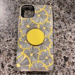Otter box 11 pro max with pop socket